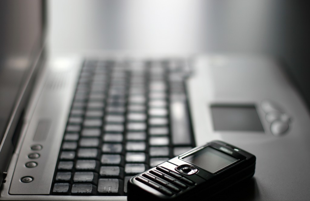 stockvault-keyboard-and-mobile-phone115316